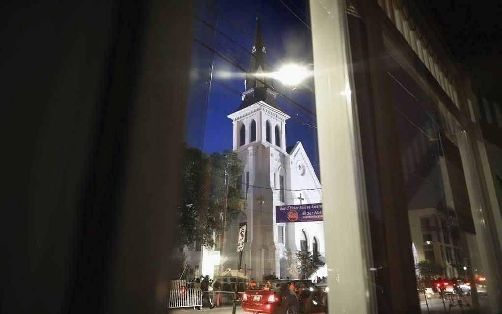 Bij de ‘zwarte’ kerk in Charleston kwamen vorige week veel mensen om hun medeleven te betuigen over de dood van negen mensen.  beeld AFP