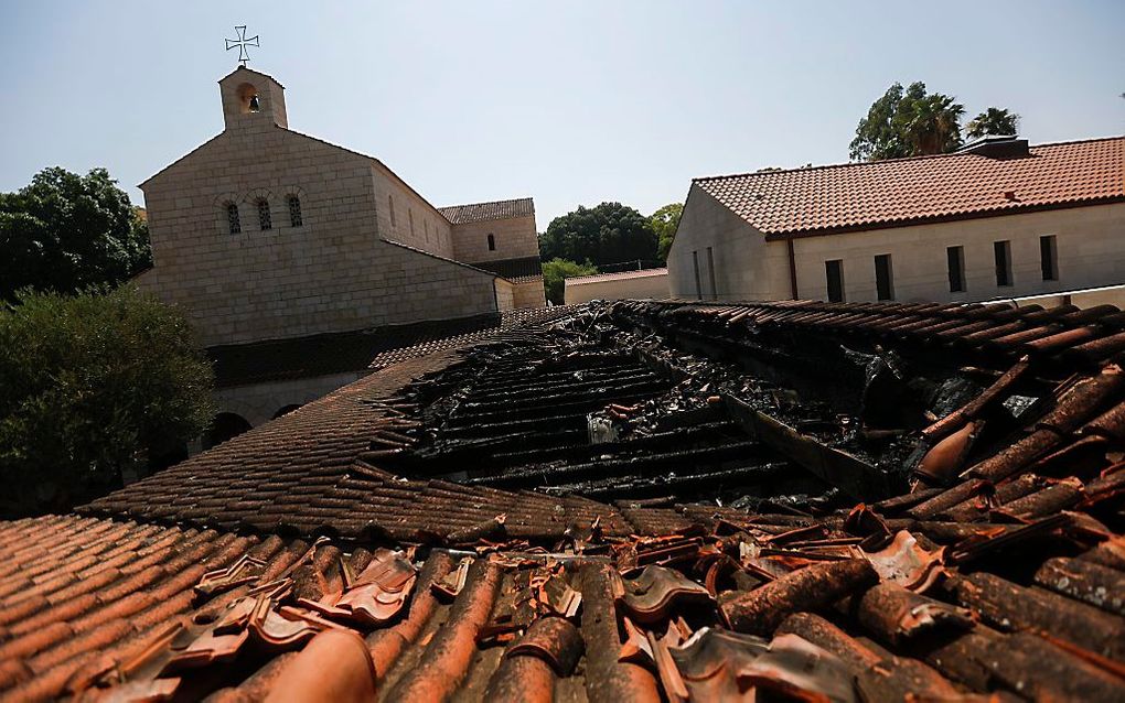 De Broodvermenigsvuldingskerk in Tabgha na de brand, vorig week.               Beeld EPA