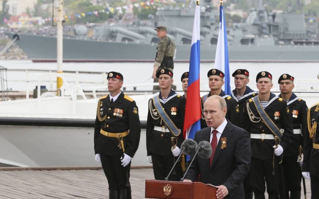 „Poetin wordt algemeen in Rusland beschouwd als een krachtig leider die het Westen weer eens ontzag inboezemt.” beeld EPA