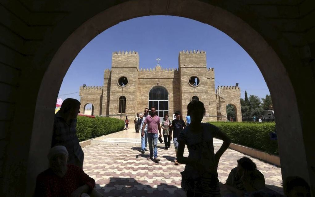 Christen schuilden in augustus 2014 in een kerk in Arbil. beeld AFP