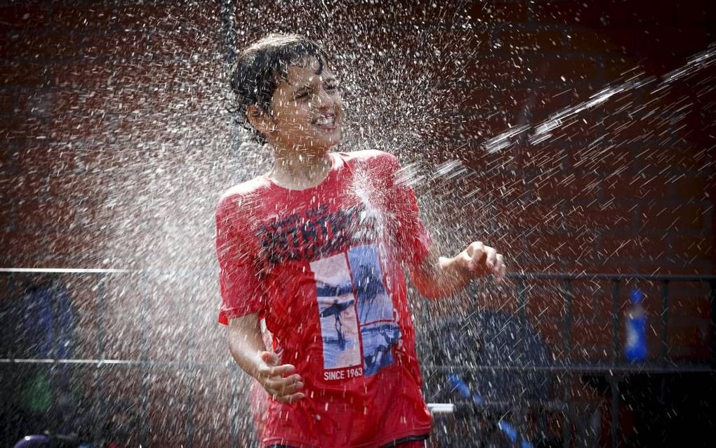 Scholen houden komende dagen een waterfeest tegen de hitte. beeld ANP