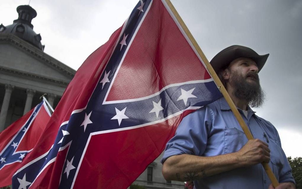 COLUMBIA. De discussie rond de confederale vlag is slechts een van de bewijzen dat de rassenscheiding in Amerika geen gesloten hoofdstuk is. beeld AFP