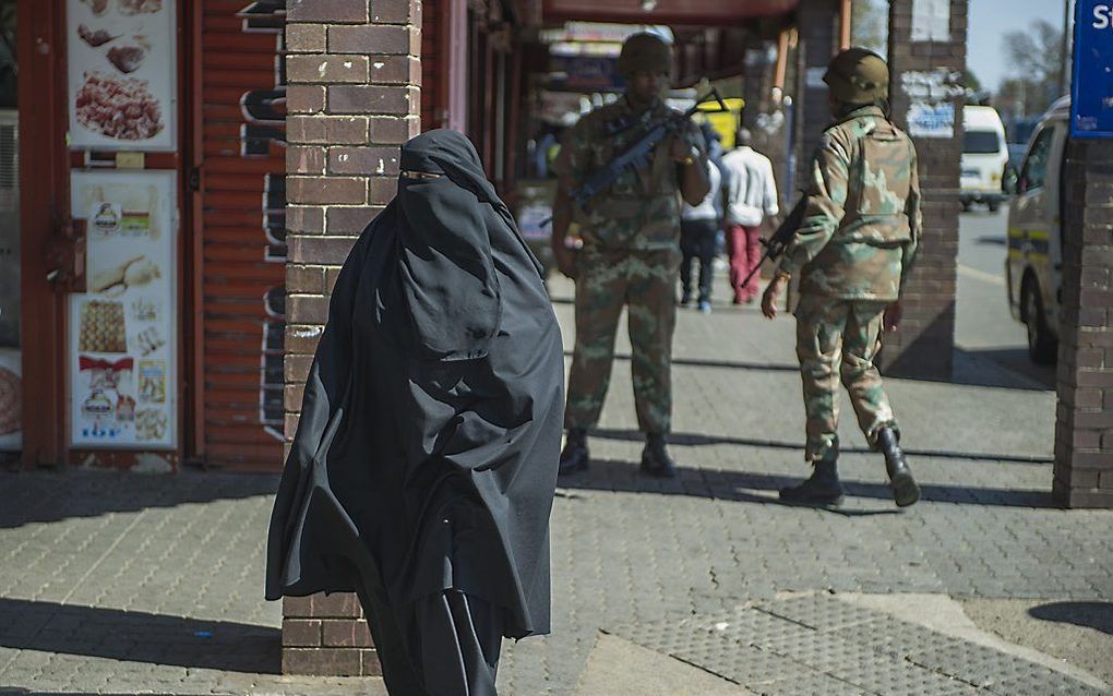 Een vrouw met een nikab. beeld AFP