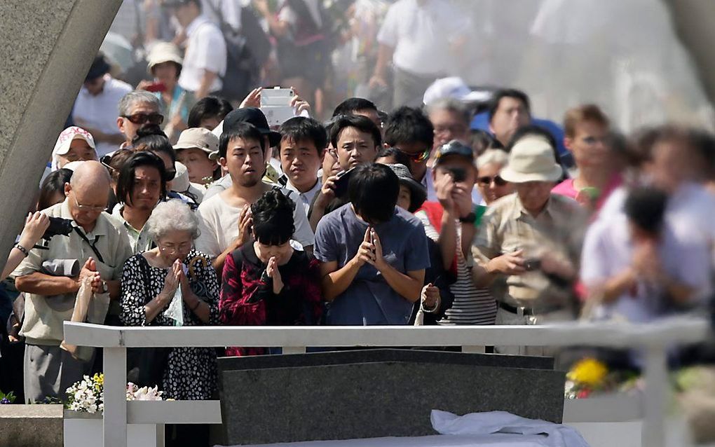 Mensen herdenken 'Hiroshima'. Beeld EPA