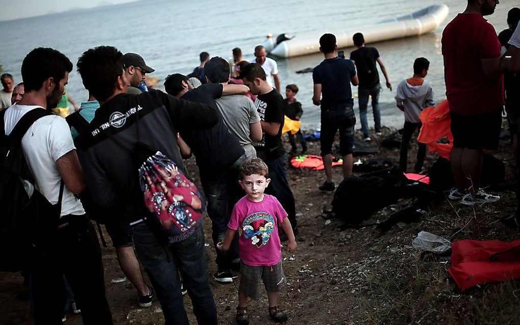 Afrikaanse migranten komen aan land. Beeld AFP