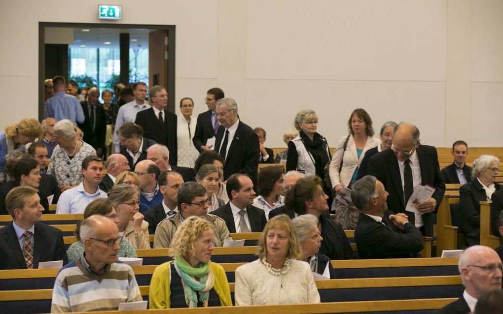 In de kerk van de gereformeerde gemeente te Gouda werd gisteren stilgestaan bij veertig jaar Cursus Godsdienst Onderwijs.  beeld Martin Droog