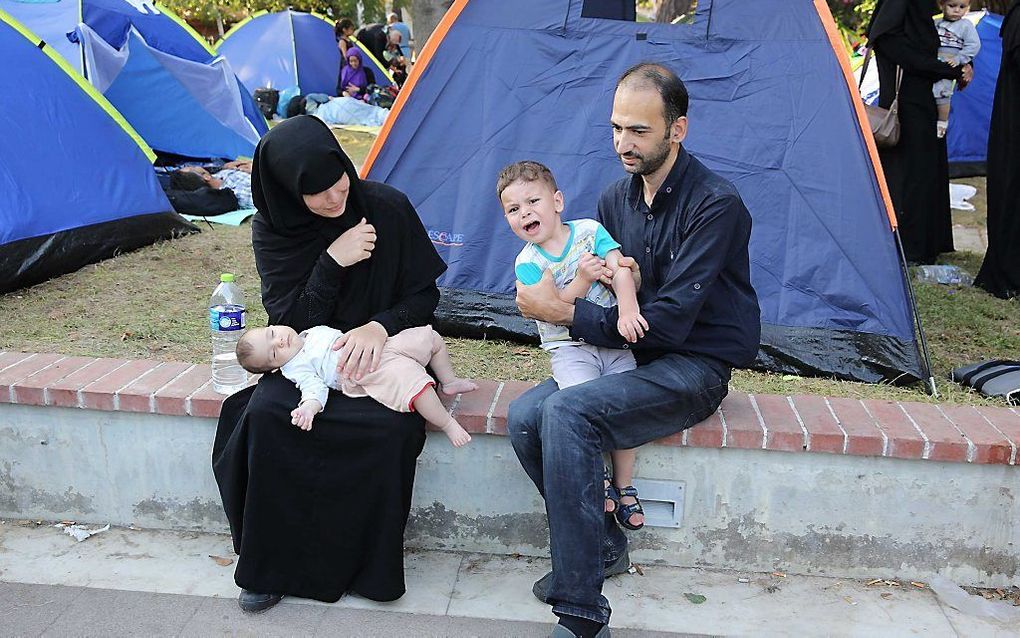 Vluchtelingengezin op Lesbos. beeld ANP