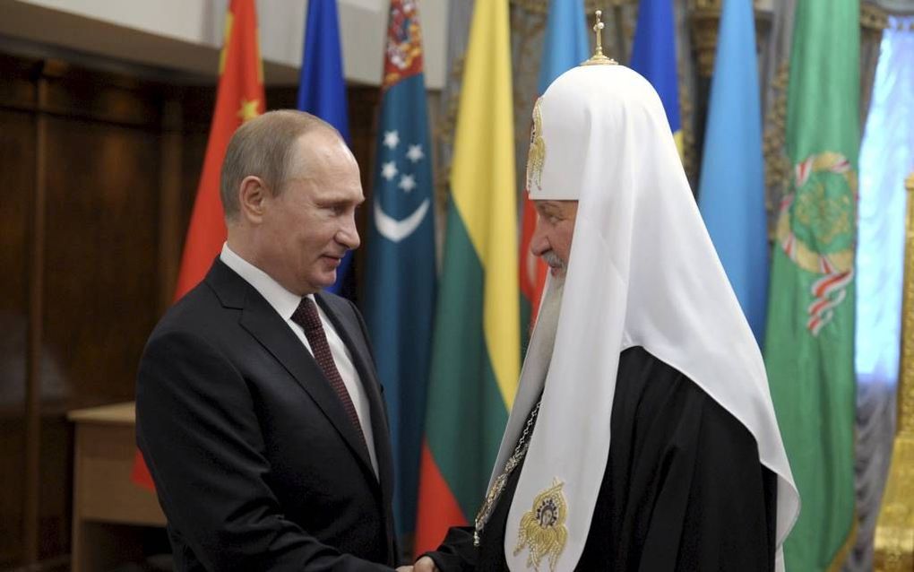 Dikke vrienden, de Russische president Putin en de leider van de Russisch-Orthodoxe Kerk, patriarch Kyrill. beeld EPA