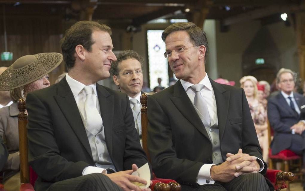 DEN HAAG. Premier Rutte en vicepremier Asscher (l.) gisteren in de Ridderzaal voorafgaand aan het voorlezen van de Troonrede door koning Willem-Alexander. beeld ANP