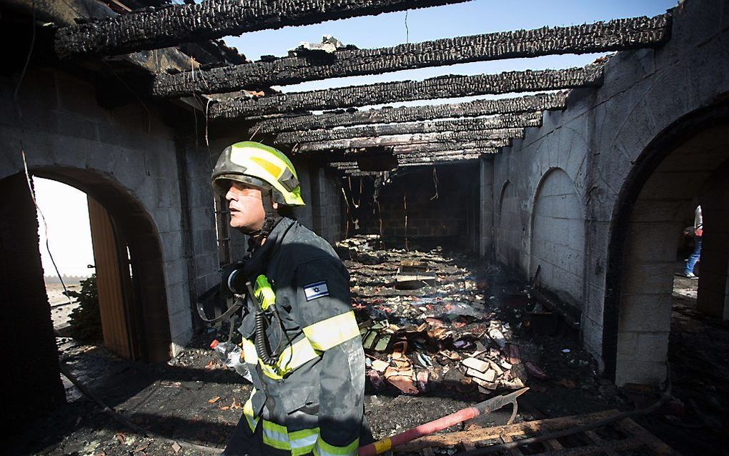 De Kerk van de Broodvermenigvuldiging in Tabgha aan het Meer van Galilea moet toch in aanmerking komen voor vergoeding van de schade die is ontstaan door de brandstichting in juni. beeld AFP