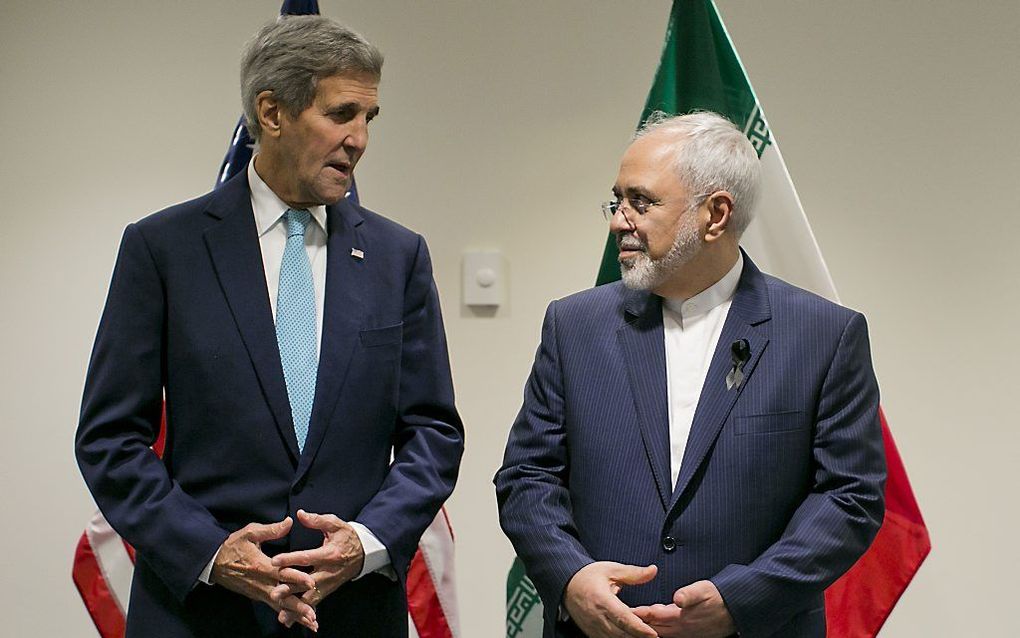 Kerry (L) en Zarif. beeld AFP