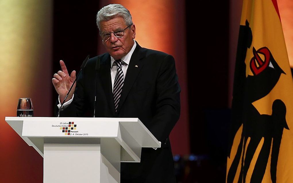 De Duitse president Joachim Gauck zaterdag tijdens de viering van de Duitse eenwording, precies 25 jaar geleden. beeld AFP