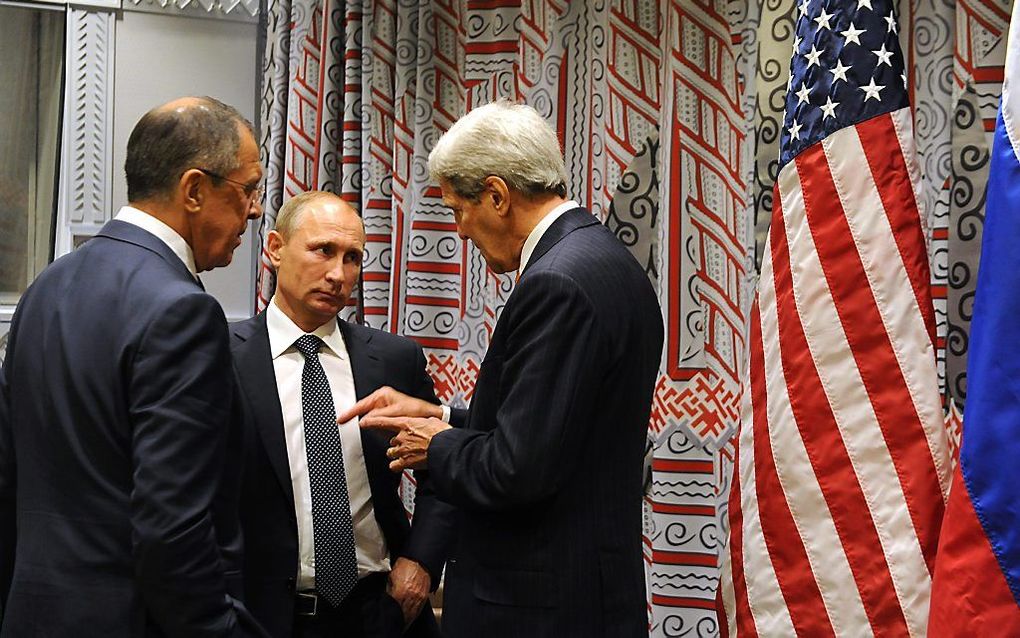 Lavrov, Poetin en minister Kerry van Amerika. Beeld EPA