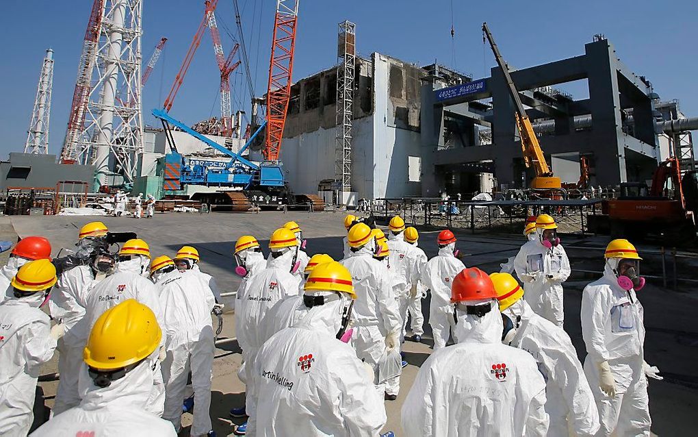 Een oud-medewerker van de Fukushima-kerncentrale in Japan heeft leukemie gekregen door radioactieve straling die vrijkwam na de tsunami en aardbeving van 2011.  beeld AFP