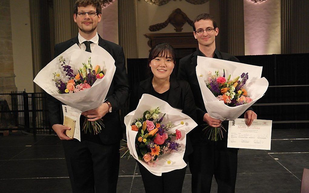 De drie finalisten (v.l.n.r.): Thomas Kientz (Frankrijk), Minji Choi (Zuid-Korea) en Martin Riccabona (Oostenrijk). beeld Jan Zwart