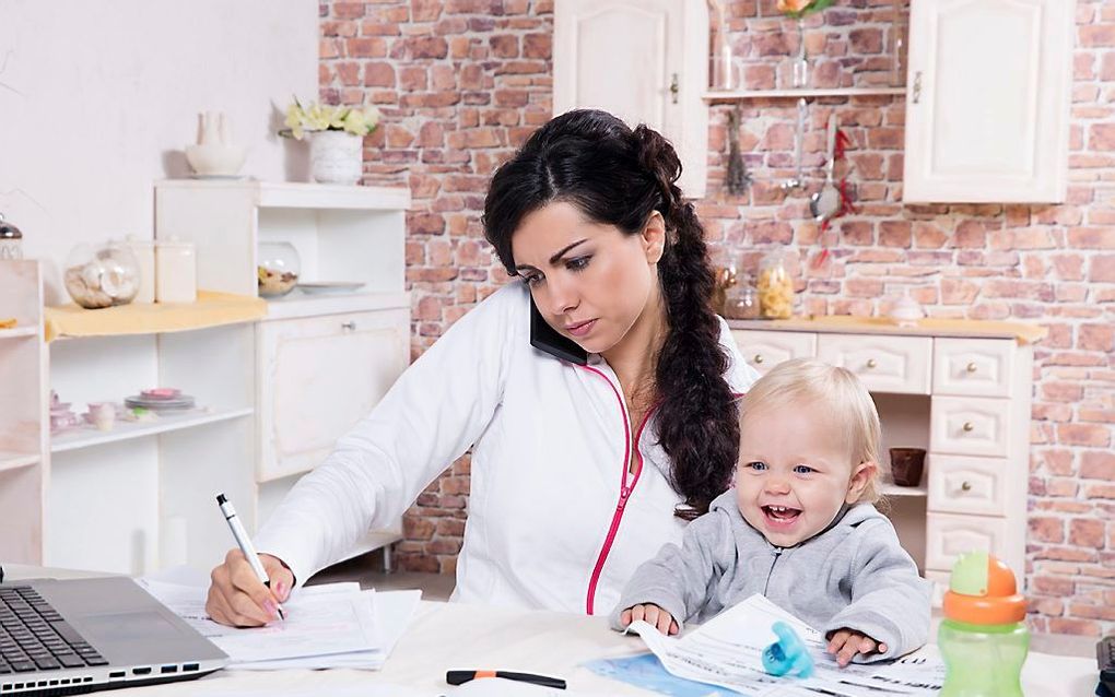 Werkende moeder. beeld iStock