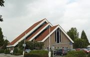 Kerkgebouw gereformeerde gemeente in Nederland te Gouda Gerbrandyweg. beeld Reliwiki