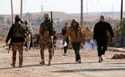 Iraakse militairen in Mosul. beeld EPA
