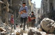 ALEPPO. De wereld lijkt zich nog nauwelijks druk te maken over de oorlog in Syrië. beeld AFP