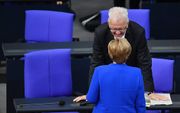 BERLIJN. De Duitse bondskanselier Merkel stemde vrijdag tegen de invoering van het homohuwelijk. beeld EPA, Oliver Lang