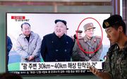 SEOUL. Beelden van een lachende Noord-Koreaanse dictator Kim Jong Un werden donderdag getoond op een tv-scherm in de Zuid-Koreaanse hoofdstad Seoul. beeld EPA, Jeon Heon Kyun ,