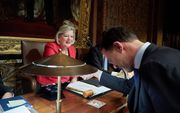 Premier Rutte begroette Kamervoorzitter Ankie Broekers dinsdagmorgen voor aanvang van de Algemene Politieke Beschouwingen in de eerste Kamer. beeld ANP, Martijn Beekman