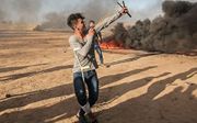 De laatste weken vielen bij protesten aan de grens tussen Gaza en Israël tientallen doden onder Palestijnen. beeld AFP
