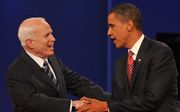 McCain (l.) en Obama. beeld AFP, Paul J. Richards