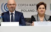 De Poolse minister Michal Kurtyka van milieu zit de 24e VN-klimaatconferentie in het Poolse Katowice voor. Naast hem de baas van het VN-klimaatbureau UNFCCC Patricia Espinosa. beeld AFP, Janek Skarzynski