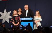 De Australische premier Scott Morrison en zijn gezin. beeld AFP