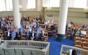 Een halflege Broederkerk (ruim 600 zitplaatsen) tijdens de laatstgehouden schooldag in 2017. beeld RD
