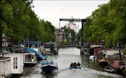 Woonboten in de Amsterdamse grachten. beeld ANP