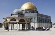 Kinderen bezoeker de Dome of the Rock moskee in Jeruzalem. beeld ANP