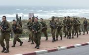 Mannen moeten in Israël verplicht drie jaar in dienst, vrouwen twee jaar. beeld AFP