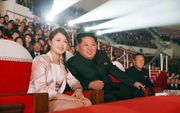 Kim Jong-un en zijn vrouw. beeld EPA