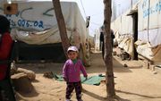 „Hoe snijdt het niet door merg en been, als we de kinderen in de tentenkampen zien, de ontzetting of de totale leegte in de ogen.” beeld ANP, Arie Kievit