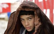 Een jonge Syrische vluchteling in Libanon. beeld AFP