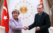 Merkel ontmoet donderdag Erdogan. beeld AFP