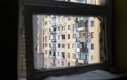 Zwaar artilleriegeschut en raketten beschadigden begin deze maand deze flatgebouwen in de regio Donetsk. Het Oekraïense leger vocht hevig tegen separatisten die worden gesteund door Rusland.  beeld EPA