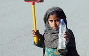 In Pakistan is schoon drinkwater schaars. beeld AFP, Farooq Naeem