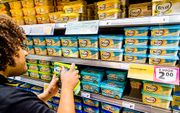 In een klein jaar tijd zijn de prijzen van margarines in de supermarkten flink gestegen. beeld ANP, Marco de Swart