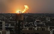 Vlammen boven Ghouta. beeld AFP