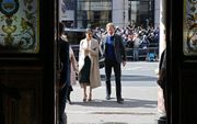 De Britse prins Harry en zijn verloofde Meghan Markle. beeld AFP