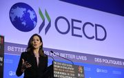 Een vergelijking tussen 25 OECD/OESO-landen over de periode 1990-2015 laat zien dat inkomensongelijkheid gepaard gaat met grotere verschillen in het geluk dat mensen beleven. Foto: de Deense kroonprinses Mary tijdens de opening van een OECD-forum in Parij