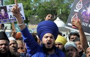 Zaterdag demonstreerden betogers tegen de verkrachting van een 8-jarig meisje uit India. beeld EPA