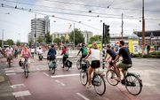 „Het gebruik van de (elektrische-) fiets als vervoersmiddel voor woon-werk verkeer neemt sterk toe als dit door de werkgever goed wordt gefaciliteerd.” beeld ANP, Koen van Weel