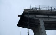 De ingestorte brug, vorig jaar, in Genua. beeld AFP