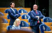 In Nederland verzetten vooral PVV, Forum voor Democratie en SGP zich tegen het pact van Marrakesh. Foto: de Kamerleden Baudet (FvD) en Fritsma (PVV) tijdens het debat in de Tweede Kamer over het migratiepact. beeld ANP, Remko de Waal
