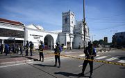 Bij de acht explosies bij kerken en hotels in Sri Lanka kwamen op eerste paasdag 290 mensen om het leven. beeld AFP