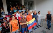 Venezolaanse militairen en politieagenten die deserteerden en naar Colombia zijn gevlucht. beeld AFP